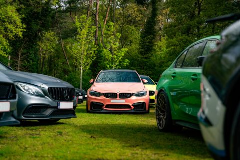 One Day Tour Back To The Runball with lots of sport cars