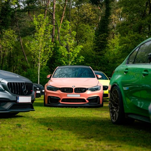 One Day Tour Back To The Runball with lots of sport cars