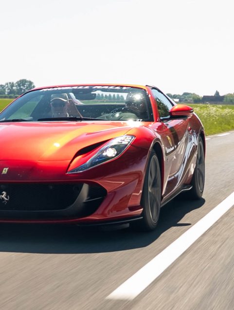 Ferrari and Porsches during the Runball Rally One Day Tour in Zeeland