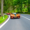 Runball Corvette Orange with a Red Ferrari behind